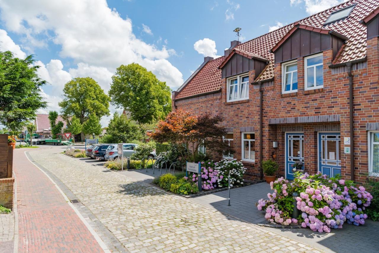 Hotel Am Fischerhafen Ditzum Esterno foto